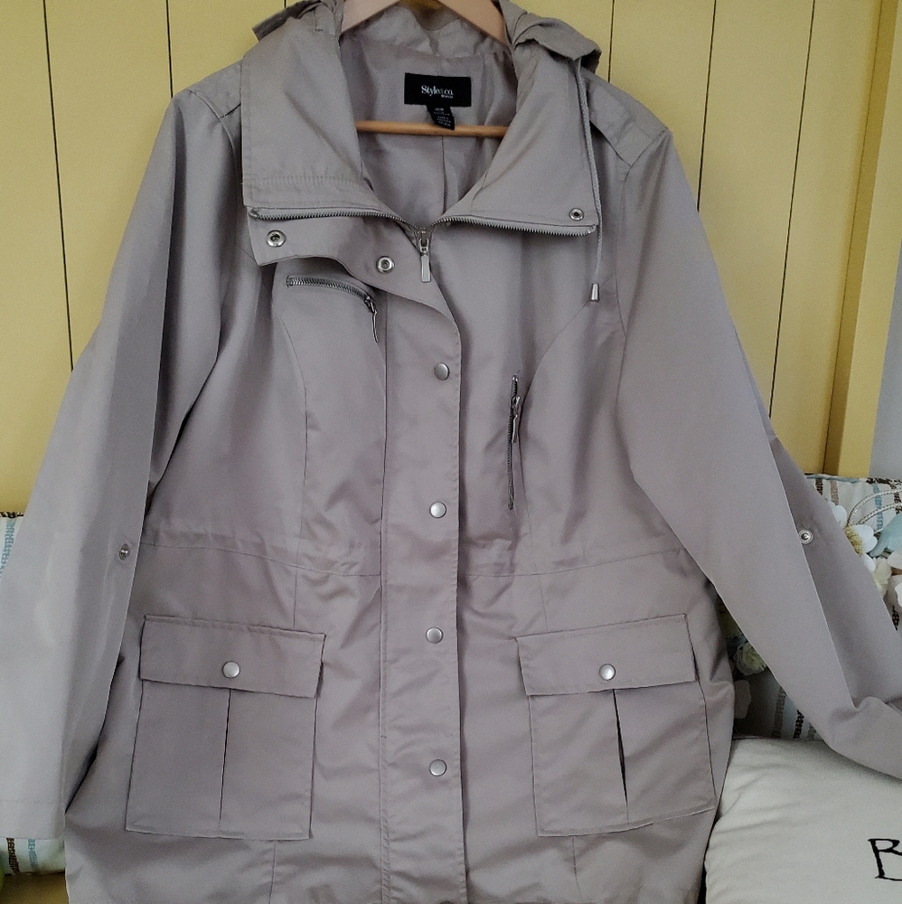 Water proof Raincoat with adjustable hoodie